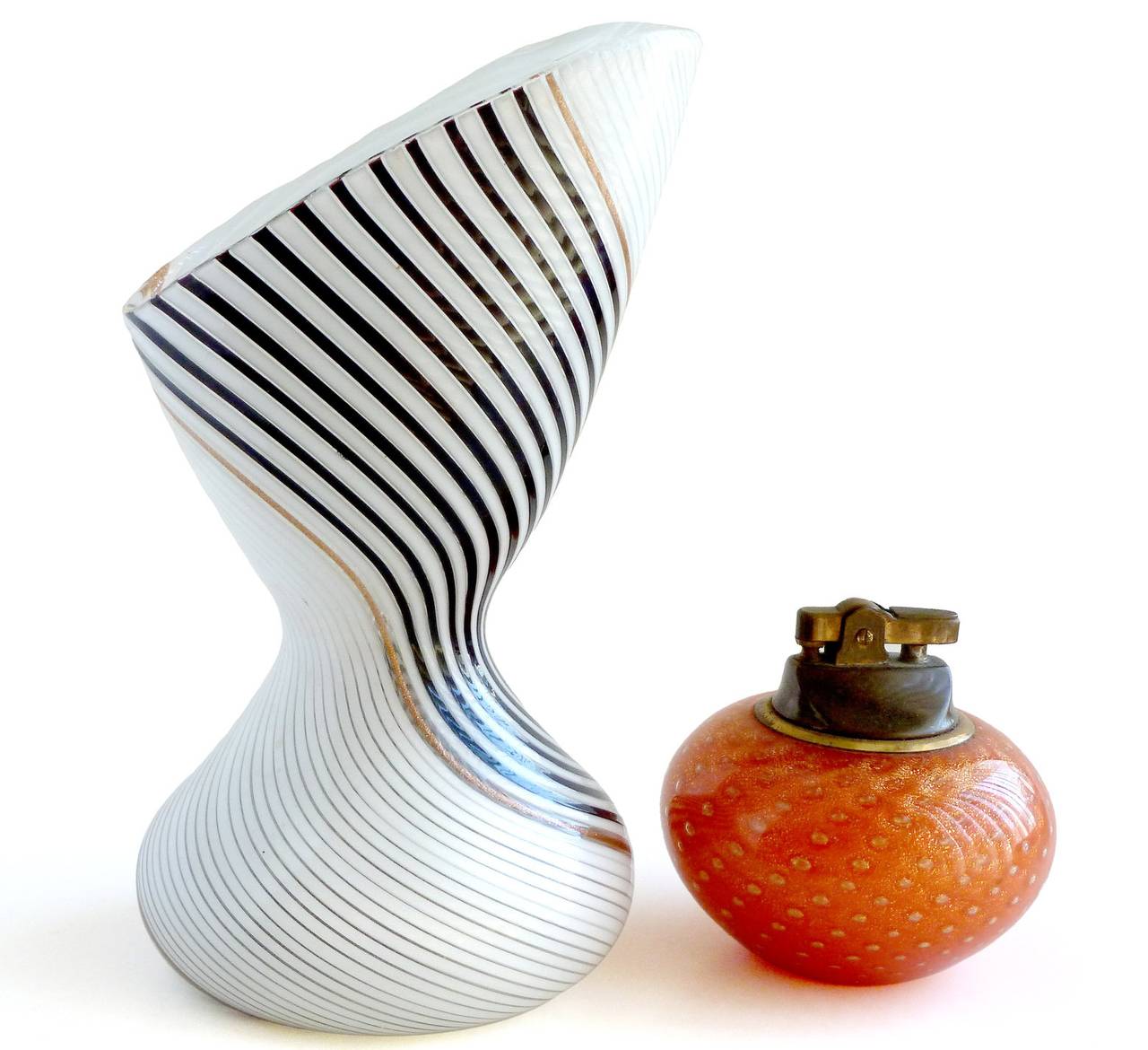 FREE Shipping Worldwide! See details below description.

Gorgeous and elegant Murano black and white filigrana ribbons vase and bowl set. Documented and published as Italian designer Dino Martens for Aureliano Toso, circa 1954. They can be seen on