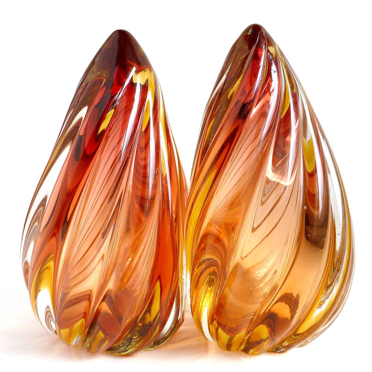 FREE Shipping Worldwide! See details below description.

Wonderful Murano handblown cranberry and orange Sommerso art glass twisting flame bookends. Documented to designer Alfredo Barbini, circa 1950-1960, and published in his catalog. Gorgeous