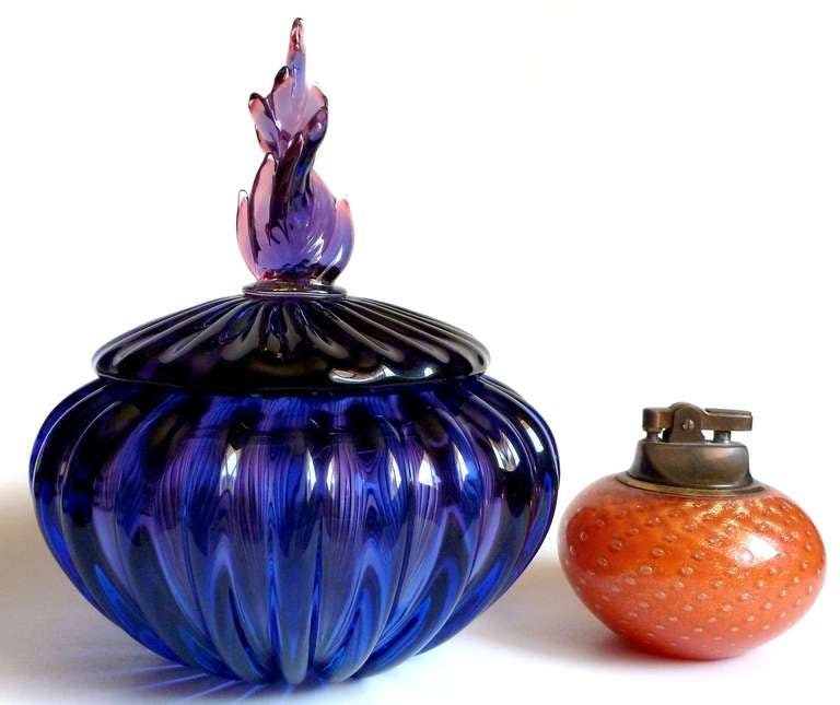Free shipping worldwide! See details below description.

Beautiful vintage Murano Sommerso purple and blue art glass vanity jewelry / powder box. Documented to designer Alfredo Barbini, circa 1950s. The piece is fairly large, with a flame top and
