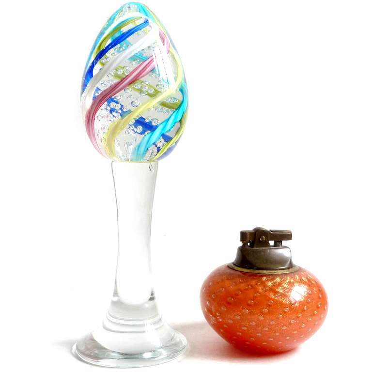 FREE Shipping Worldwide! See details below description.

Beautiful Set of Murano Hand Blown Easter Egg Paperweights in Millefiori Flower Murrine and Ribbon Designs. Documented to the Fratelli Toso company, 2 with original labels. The group