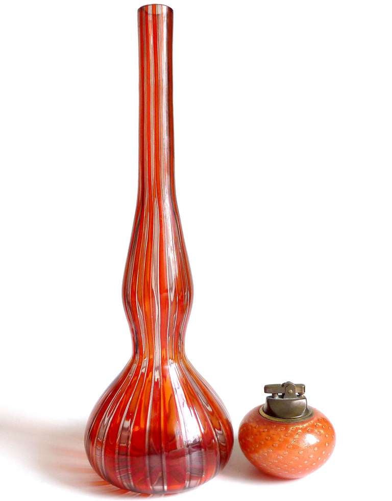 FREE Shipping Worldwide! See details below description.

Colorful Set of 3 Murano Hand Blown Art Glass Decanters or Floor Vases. Attributed to Fratelli Toso, 2 of which have 