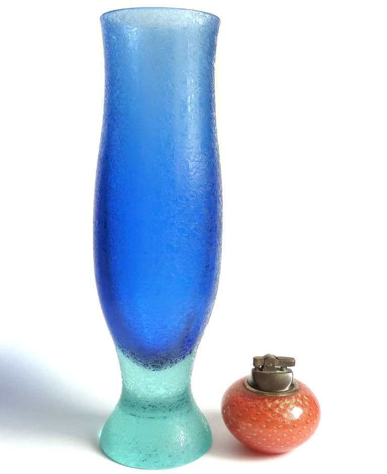 FREE Shipping Worldwide! See details below description.

Rare Murano Hand Blown Sommerso Cobalt and Aqua Blue Art Glass Flower Vase, with Corroso Texture. Documented and signed on the bottom 