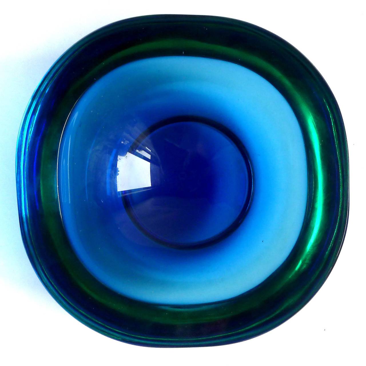 FREE Shipping Worldwide! See details below description.

Beautiful Murano Hand Blown Aqua Blue Green and Deep Cobalt Blue Art Glass Bowl. Attributed to designers Flavio Poli and Archimede Seguso for the Seguso Vetri D' Arte company. The piece is