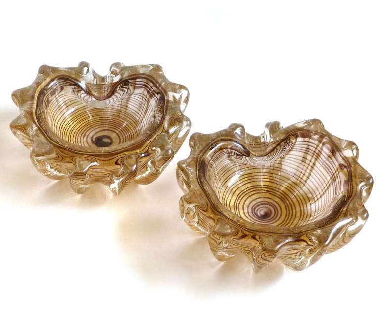 FREE Shipping Worldwide! See details below description.

Unusual Murano Hand Bown Gold Flecks and Purple Swirl Stripe Art Glass Sea Urchin Shell Shaped Bowls. Documented to Ercole Barovier for the Barovier e Toso company. They have a ribbed body