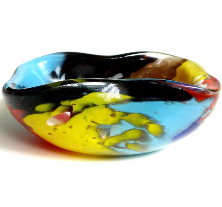 Free Shipping Worldwide! See details below description.

Colorful Murano Hand Blown Multicolor and Aventurine Flecks Art Glass Jewelry or Ring Dish. Documented to designer Dino Martens for Aureliano Toso, circa 1950s. Still retains the original