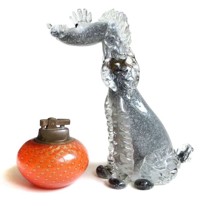 FREE Shipping Worldwide! See details below description.

Gorgeous and Rare Murano Hand Blown Gray Pulegoso Bubbles with Black and Gold Flecks Accepts Art Glass Poodle Dog Sculpture. Published and documented to designer Alfredo Barbini, circa