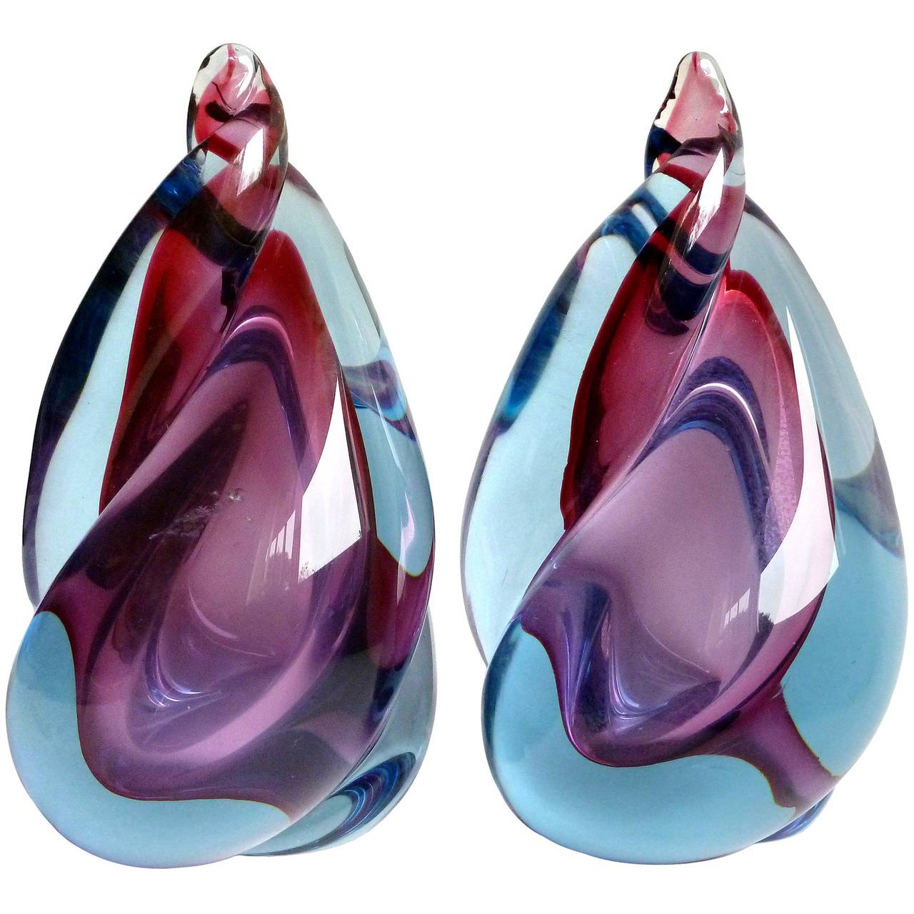 FREE Shipping Worldwide! See details below description.

Colorful Murano Hand Blown Blue over Purple Sommerso Art Glass Bookends in Twisting Flame Design. Documented to designer Alfredo Barbini, circa 1950-1960, and published in his catalog. Great