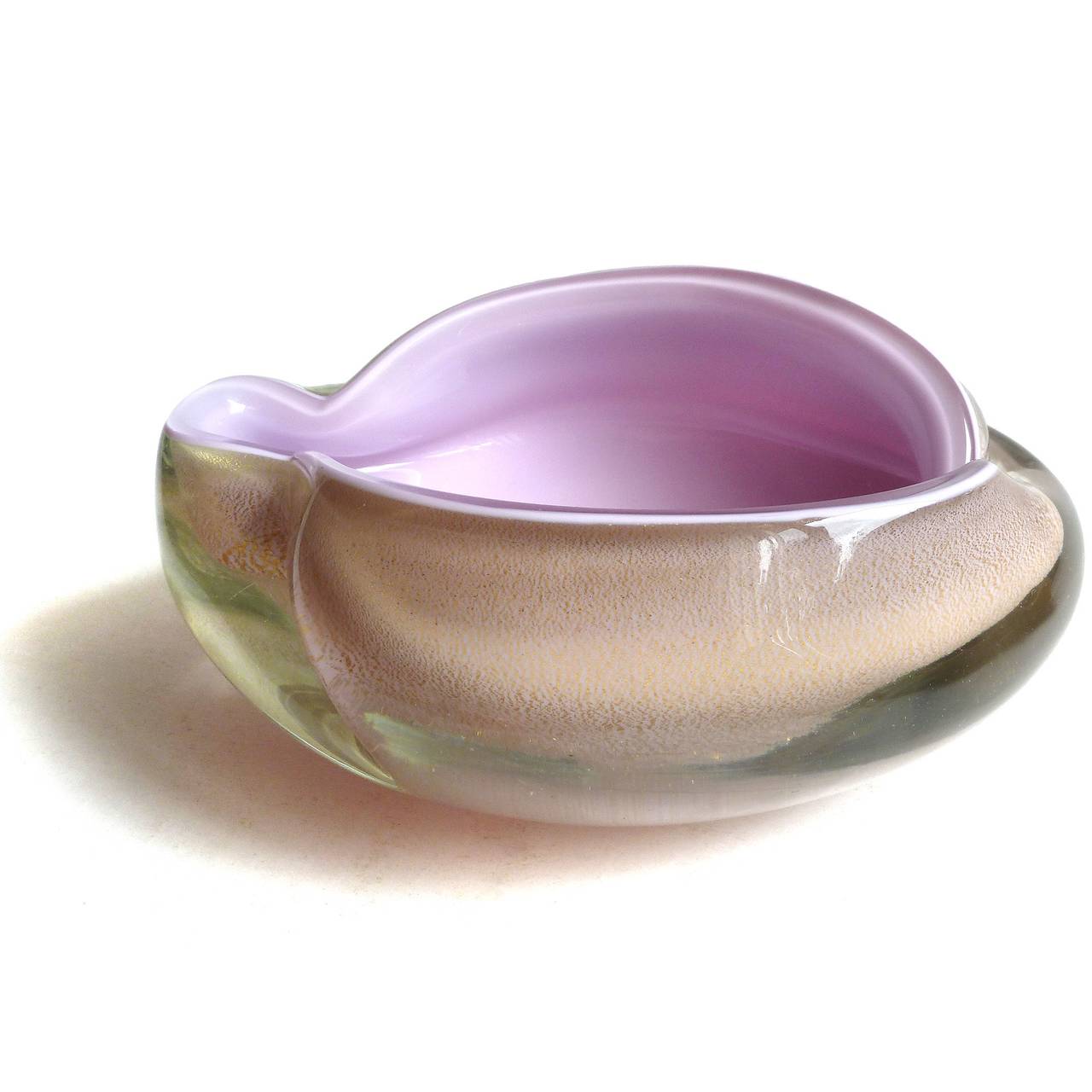 Free shipping worldwide! See details below description.

Wonderful Murano handblown lavender and gold flecks art glass decorative bowl. Documented to designer Alfredo Barbini. The piece has an organic shape, profusely covered in gold leaf on the