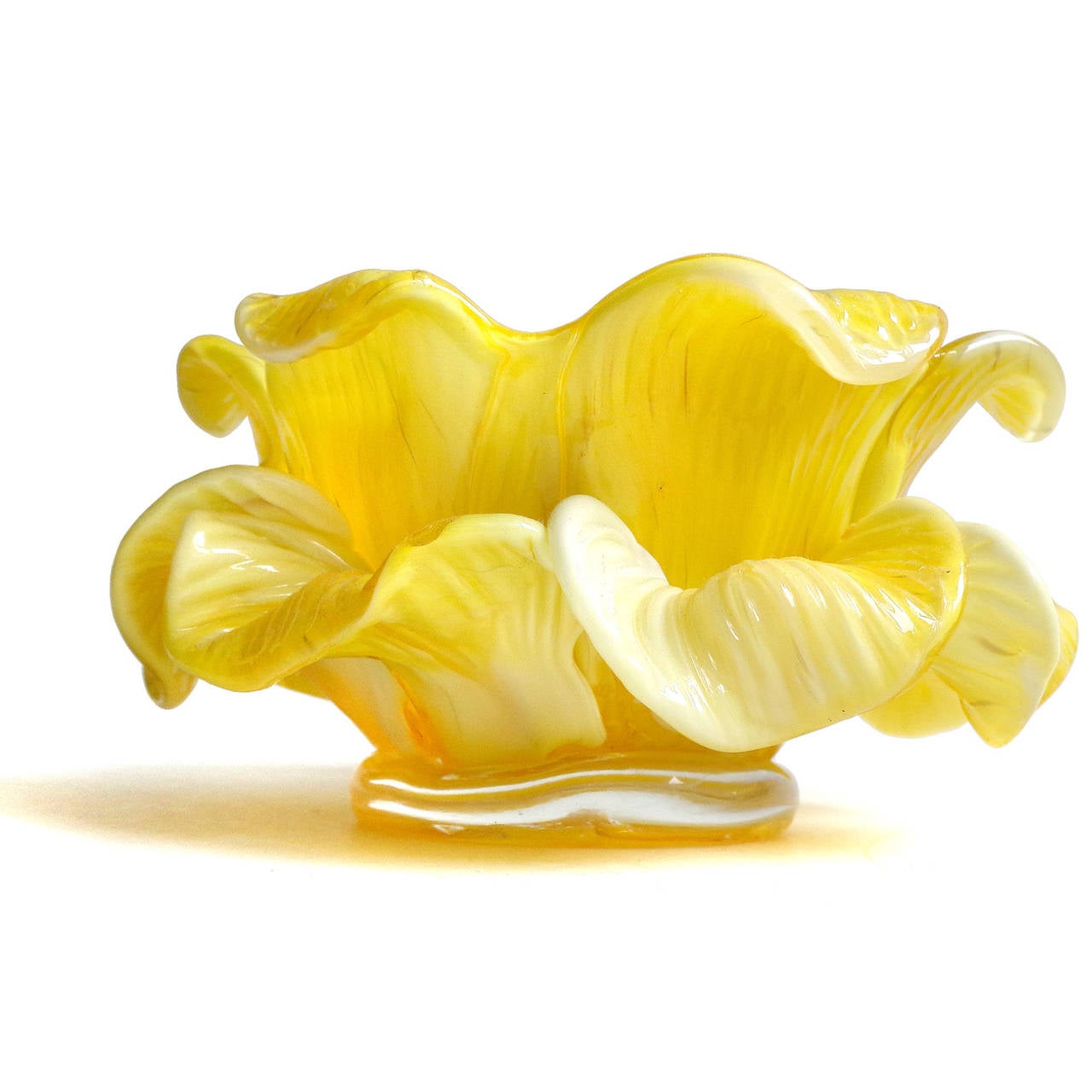 Free shipping worldwide! See details below description.

Beautiful set of Murano handblown, yellow with white double petals flower bowls. Attributed to the Fratelli Toso Company, circa 1950s. Each has a glass disk on the bottom, and mottled effect