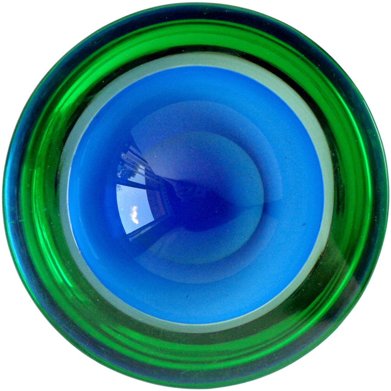 Free shipping worldwide! See details below description.

Superb Murano handblown cobalt blue and green Sommerso art glass decorative bowl. Attributed to the Seguso Vetri D' Arte company. The piece is very thick and heavy, with a round shape and 1
