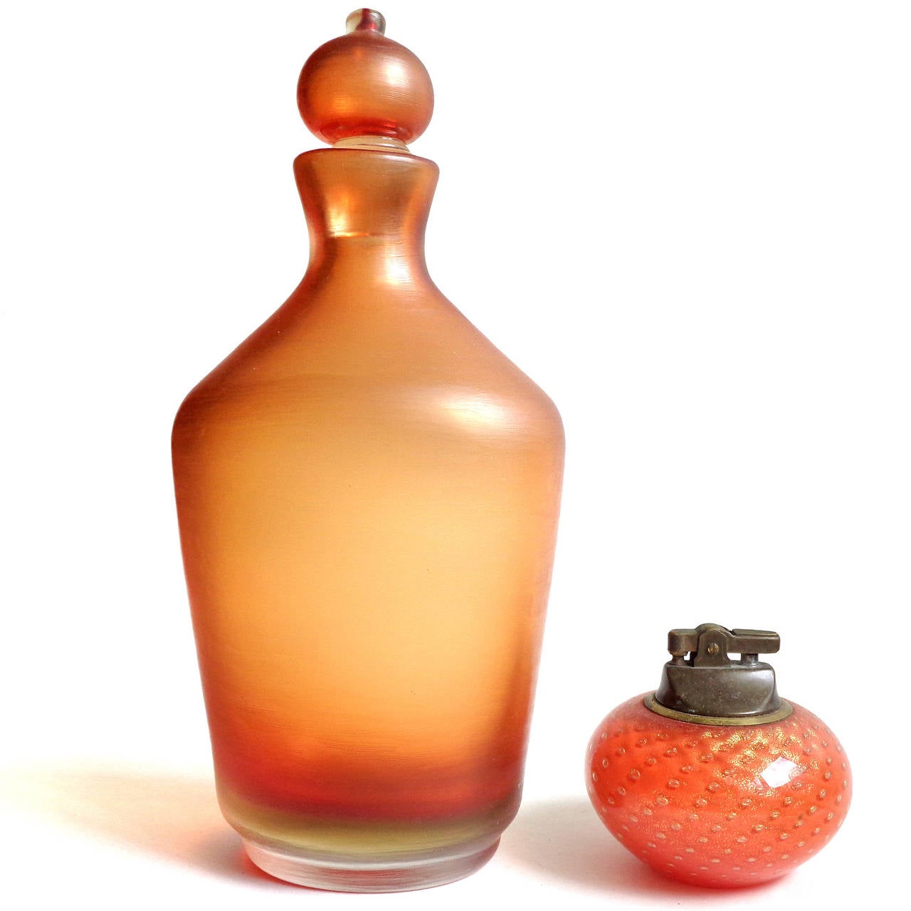 Free shipping worldwide! See details below description.

Incredible Murano handblown fiery orange Sommerso art glass decanter with etched surface. Documented to designer Paolo Venini for the Venini company, in the 