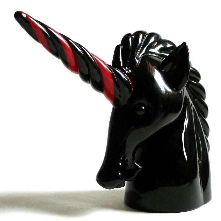 FREE Shipping Worldwide! See details below description.

Rare Murano Hand Blown Black Art Glass Unicorn Head Sculpture with Red Swirl Horn. Created for Cartier and signed underneath, and blown by the Vetreria Archimede Seguso glass company, circa