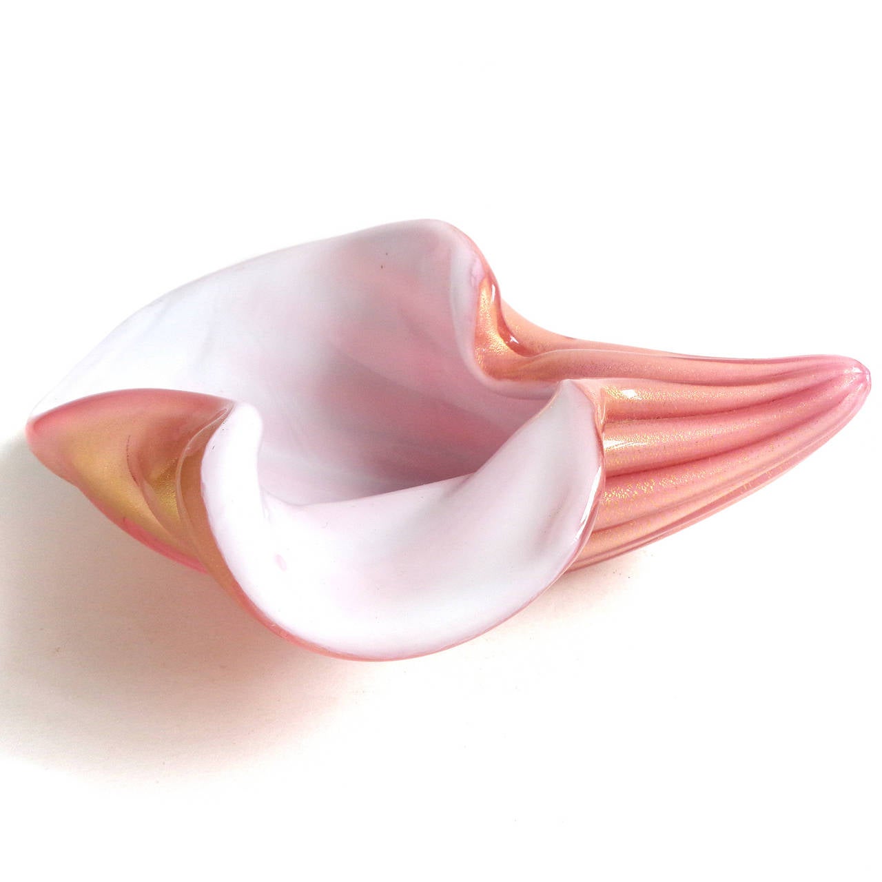 Free shipping worldwide! See details below description.

Gorgeous Murano handblown pink over white and gold flecks art glass conch shell bowl. Attributed to designer Alfredo Barbini. The piece has a ribbed body, with heavy gold leaf throughout.