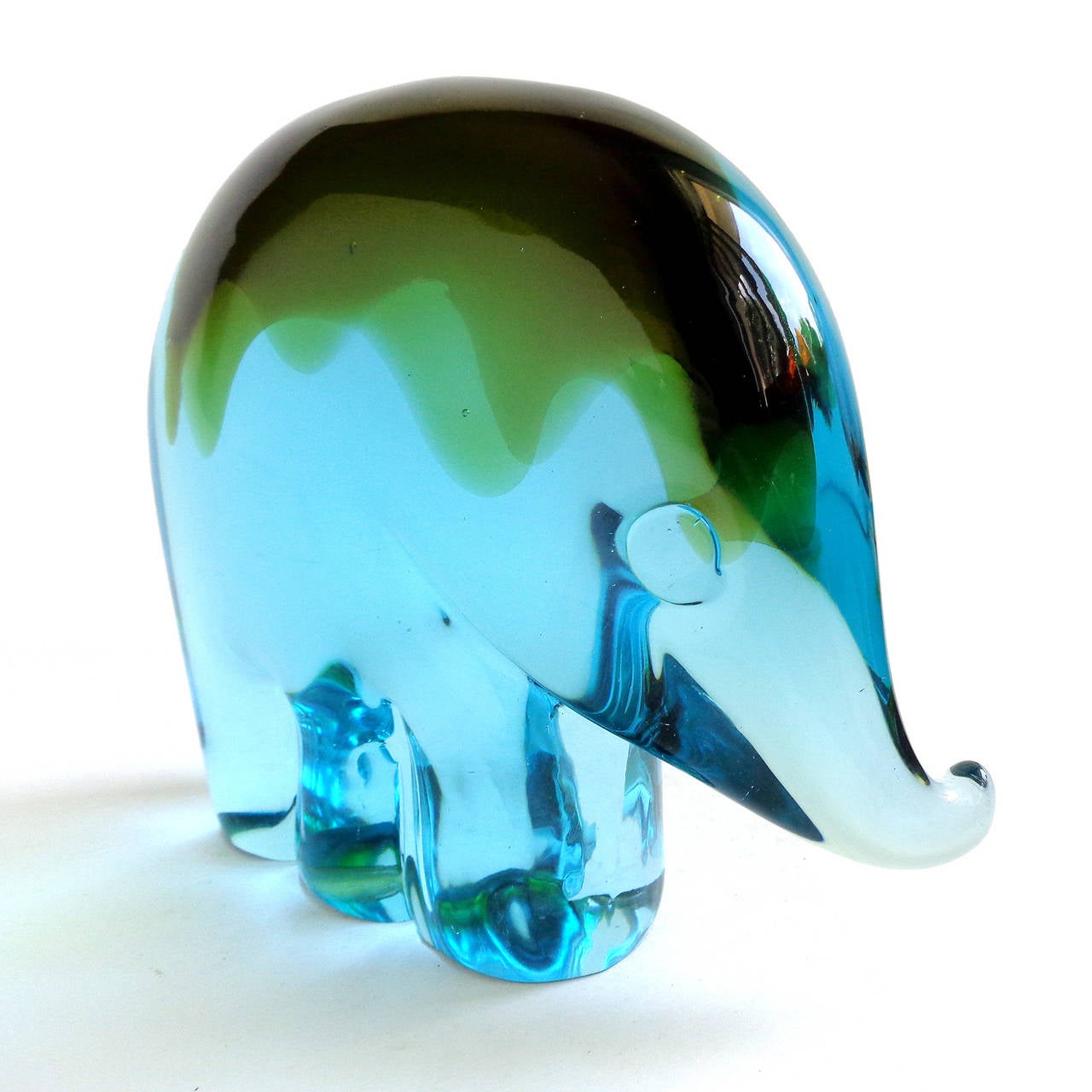 Free shipping worldwide! See details below description.

Large Murano hand blown blue and green Sommerso art glass elephant sculpture. Documented to designer Luciano Gaspari for the Salviati company. This cute elephant has the original label. See