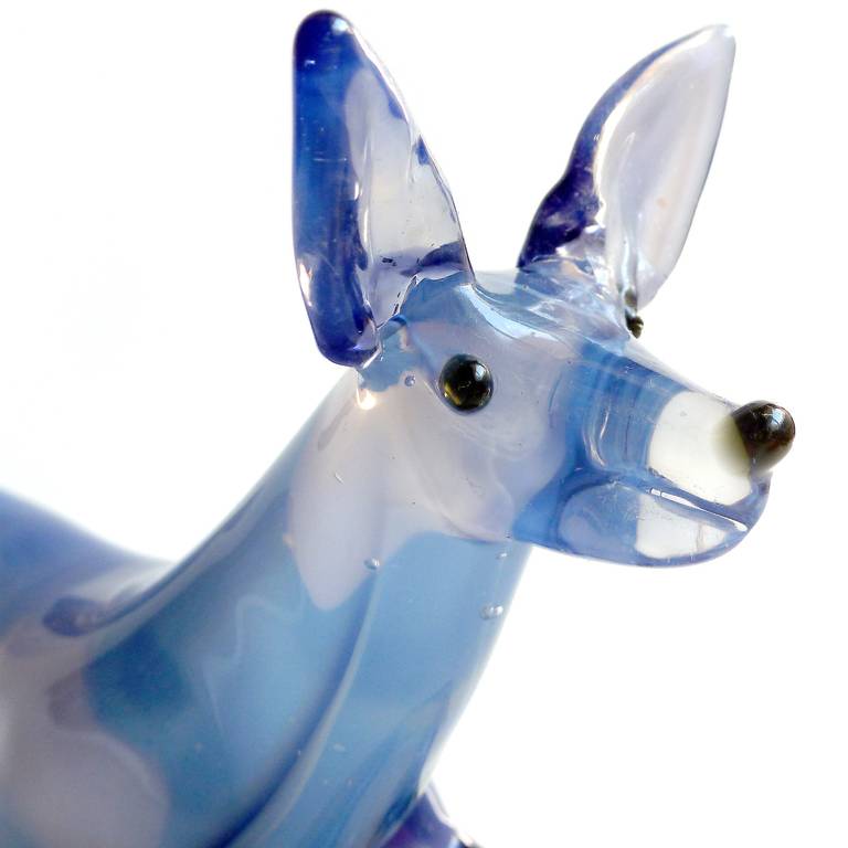FREE Shipping Worldwide! See details below description.

Gorgeous Murano Hand Blown Opalescent Blue Italian Art Glass Fox Sculpture on Gold Flecks Base. Documented to the Cenedese company, with original label on the side. A unique and rare
