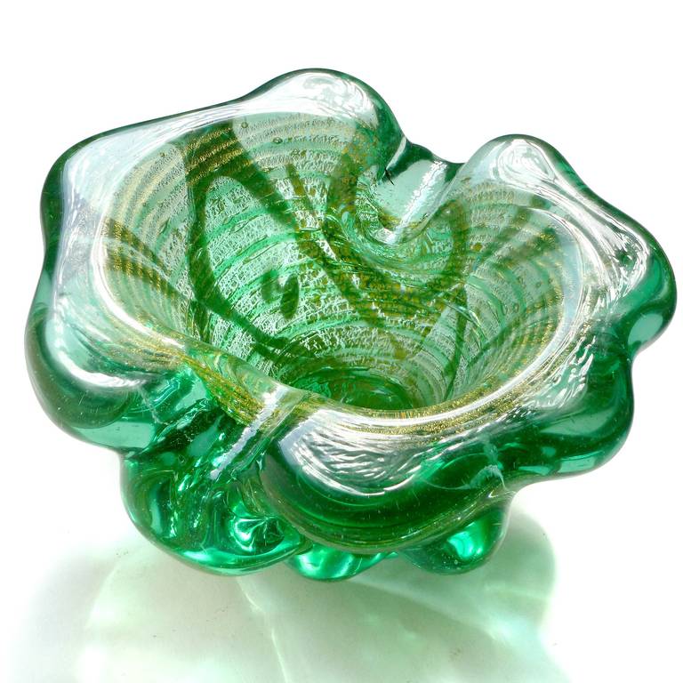 FREE Shipping Worldwide! See details below description.

Large and Thick Murano Hand Blown Green and Gold Flecks Swirl Art Glass Bowl. Documented to designer Ercole Barovier, for Barovier e Toso. The piece has a sculptural shape, with melted ball