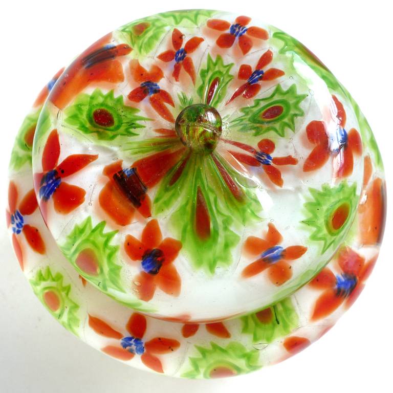 FREE Shipping Worldwide! See details below description.

Rare Murano hand blown Millefiori Flower Mosaic design art glass vanity jewellery / powder box. Documented to the Fratelli Toso company, circa 1940-50s. Very unusual design over white, with