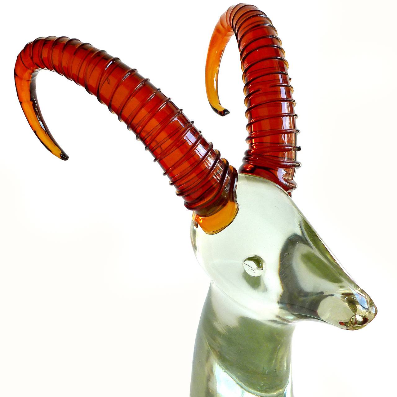 Incredible large Murano hand blown crystal clear and red amber big horn Italian art glass Antelope head sculpture. Documented to the Salviati company, and measures 15 3/4" tall. I have shown on the last photo a detail where the glass ribs do