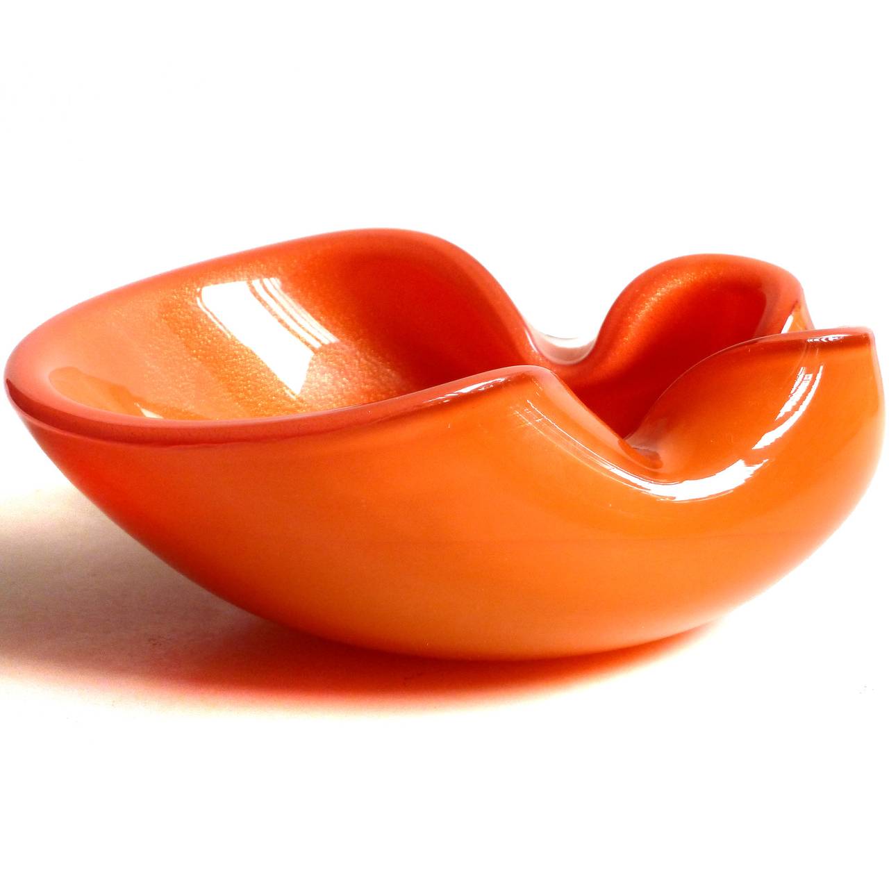 FREE Shipping Worldwide! See details below description.

Gorgeous Murano hand blown persimmon orange and gold flecks art glass bowl. Documented to designer Alfredo Barbini, circa 1950-60s. The piece has a crimped rim and bright color. Would make a