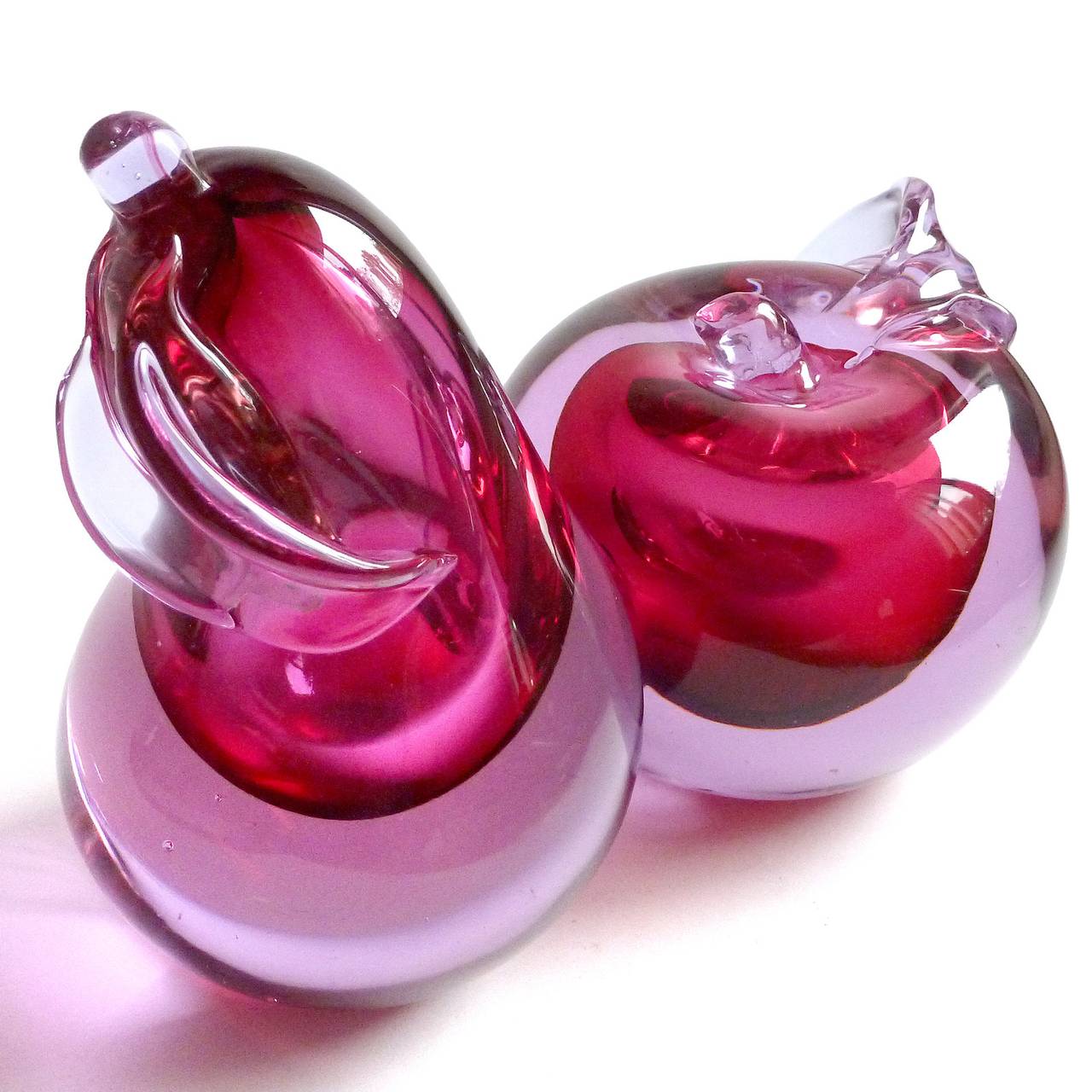 FREE Shipping Worldwide! See details below description.

Very Large Murano Hand Blown Apple and Pear Sommerso Lavender Pink with Red Cores Art Glass Bookends. Documented to the Cenedese company. As you can see, the outside layers change color to