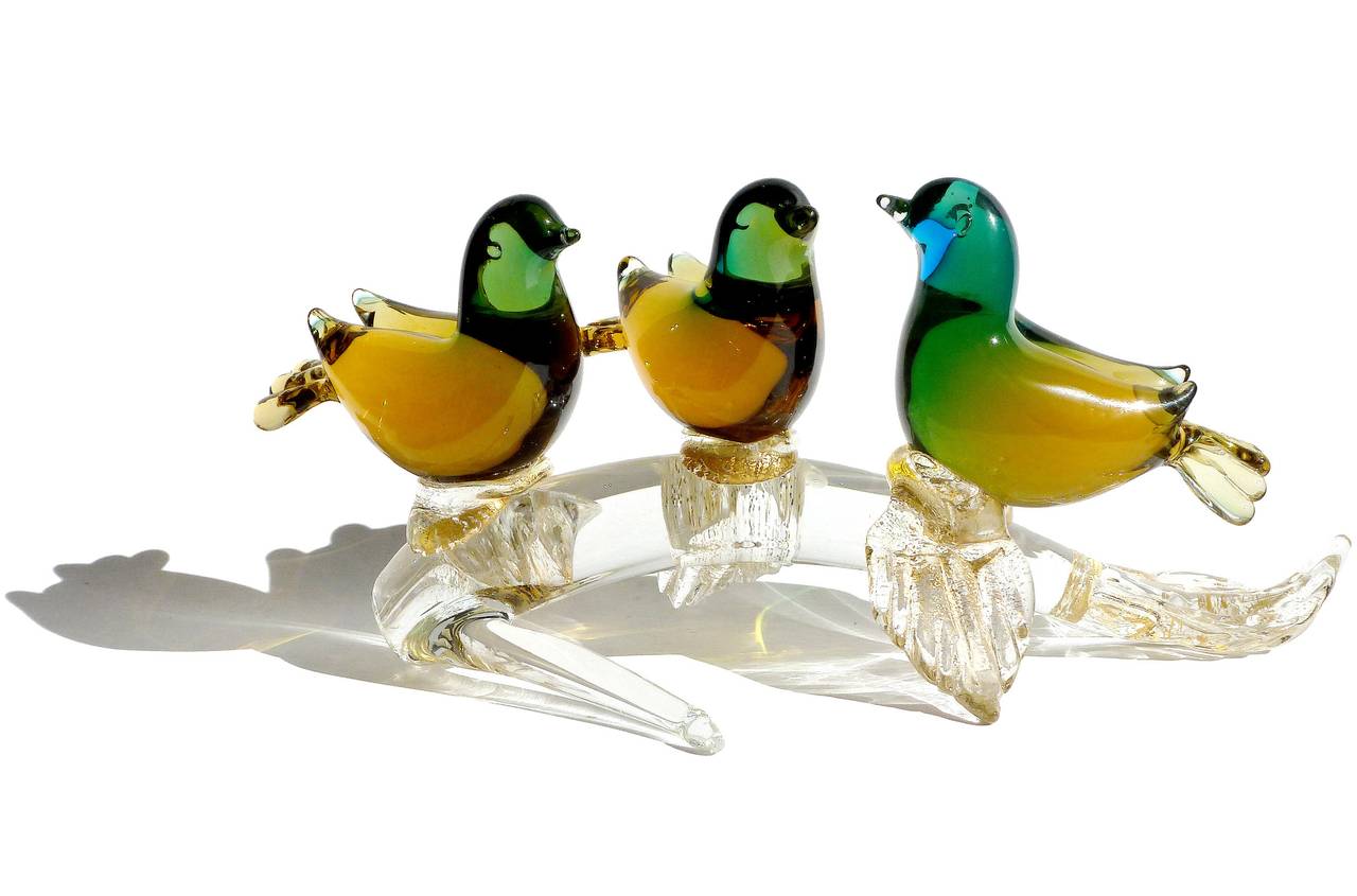 FREE Shipping Worldwide! See details below description.

Very Cute Murano Hand Blown Sommerso Green to Orange and Gold Flecks Art Glass Birds on Branch Sculpture. Documented to the Seguso Vetri D' Arte company, and published in their catalogmodel