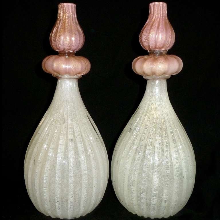 Free Shipping Worldwide! See details below description.

Beautiful Murano Hand Blown White, Pink and Gold Flecks Art Glass Wall Sconces. Attributed to the Barovier e Toso company, in the Pulegoso technique. The main body in white has a ribbed