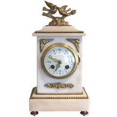 Striking Alabaster and Gilt Mantel Clock
