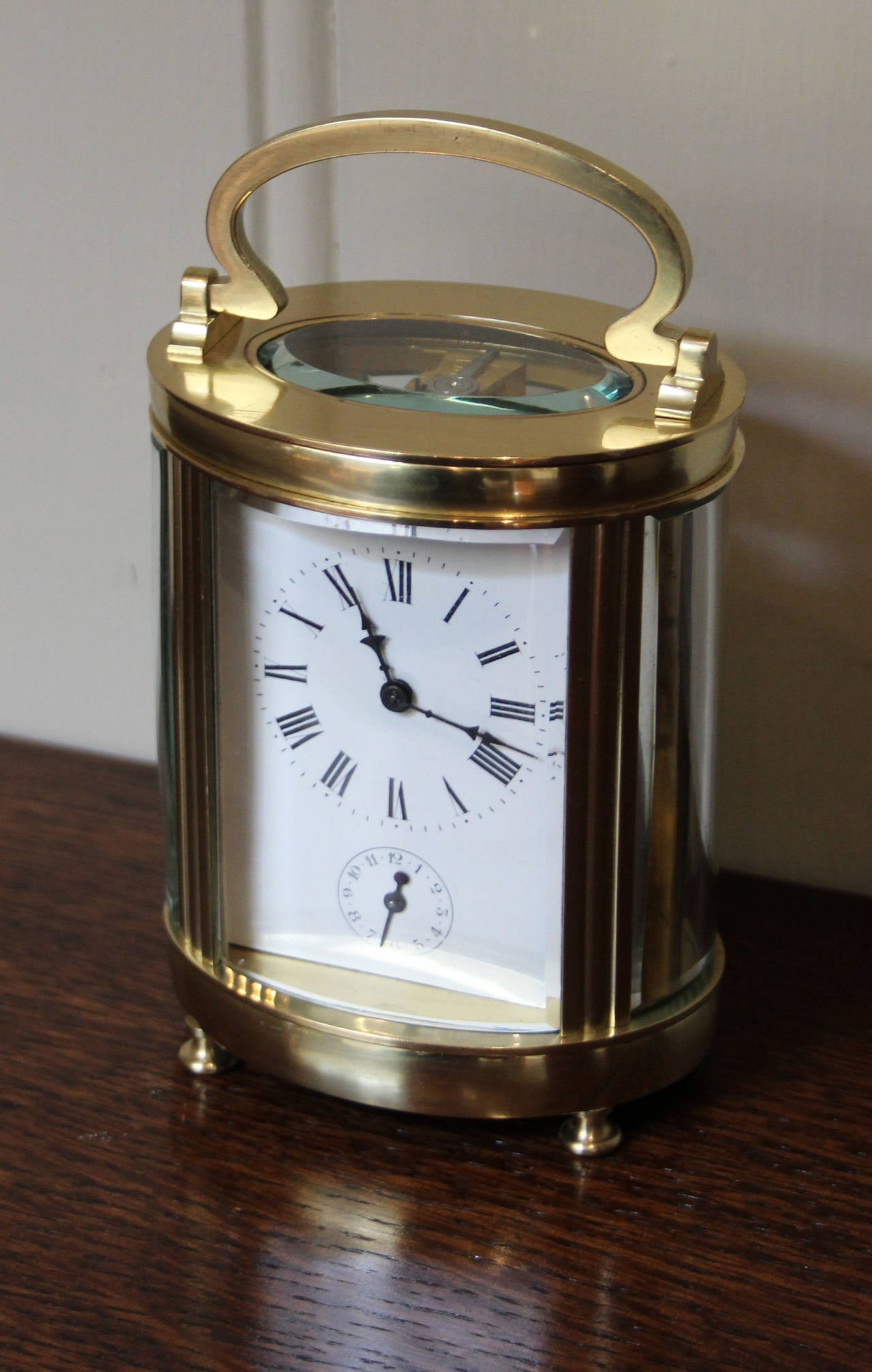 French Large Late 19th Century Oval Alarm Carriage Clock
