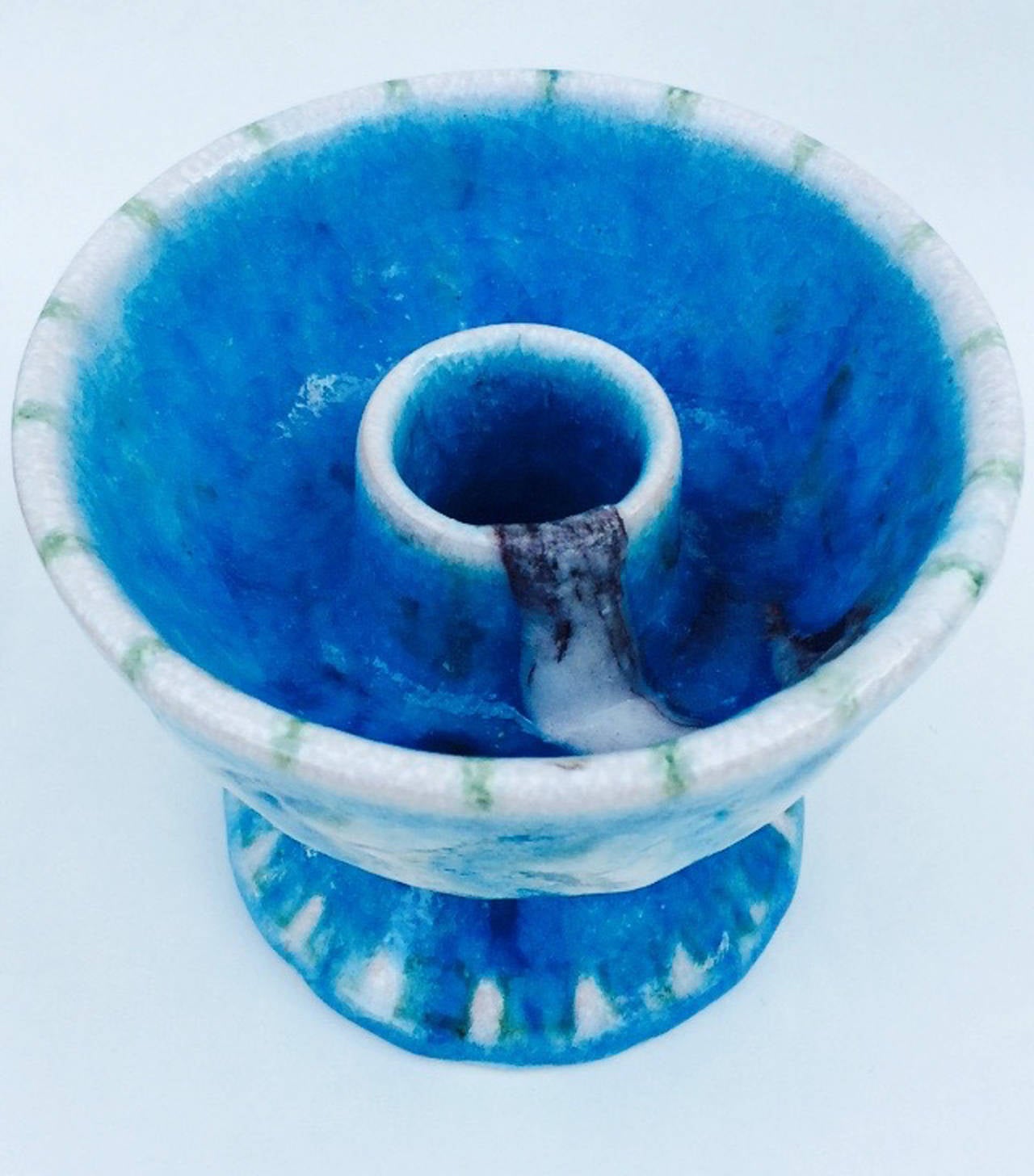 A fine Guido Gambone ceramic candlestick. Signed item features a vibrant blue, white, black ceramic glaze. Excellent with no issues.