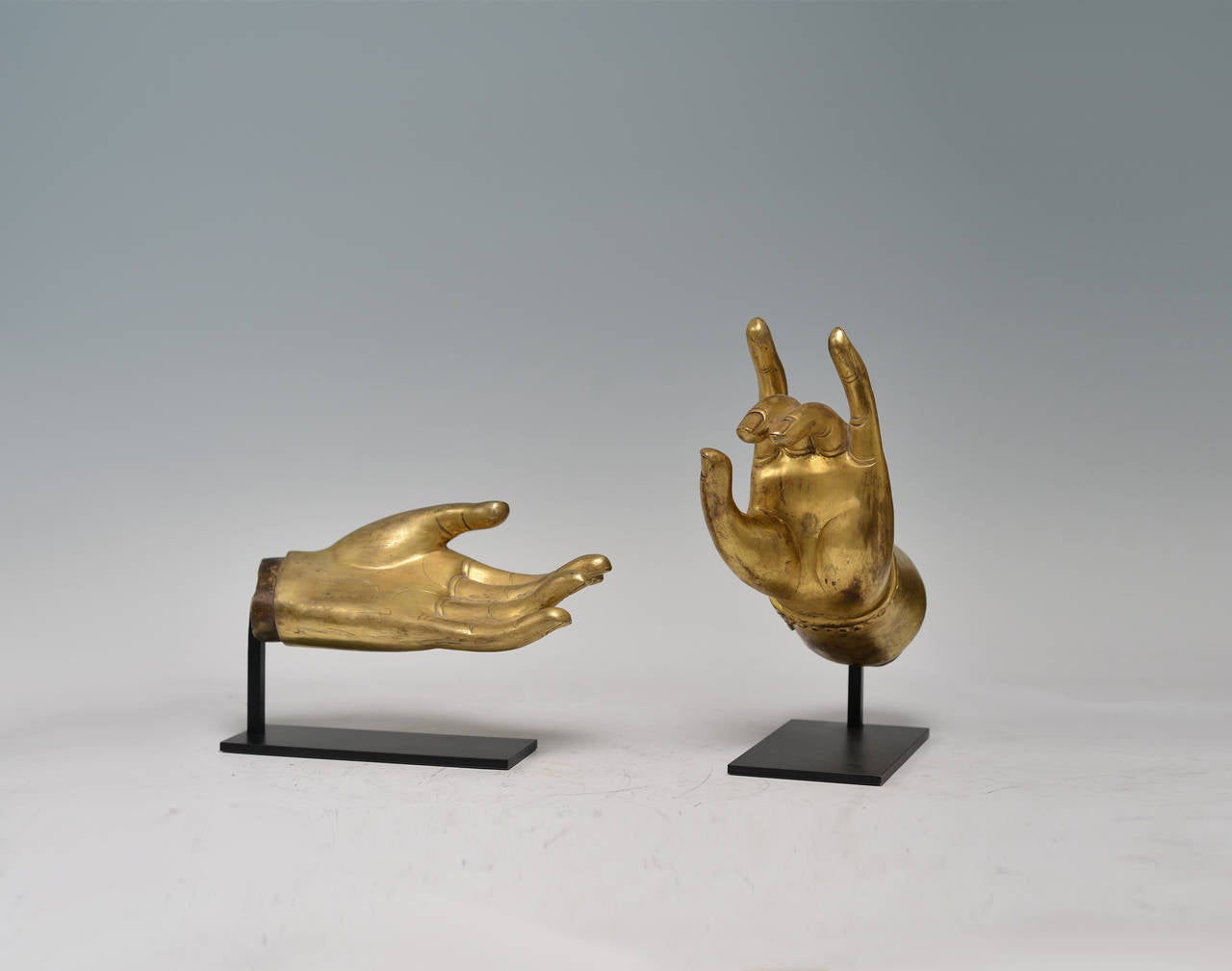 Fine cast gilt bronze Buddha hands from Tibet, left hand in giving mudra and right hand in teaching mudra.
Dimension: 10.5