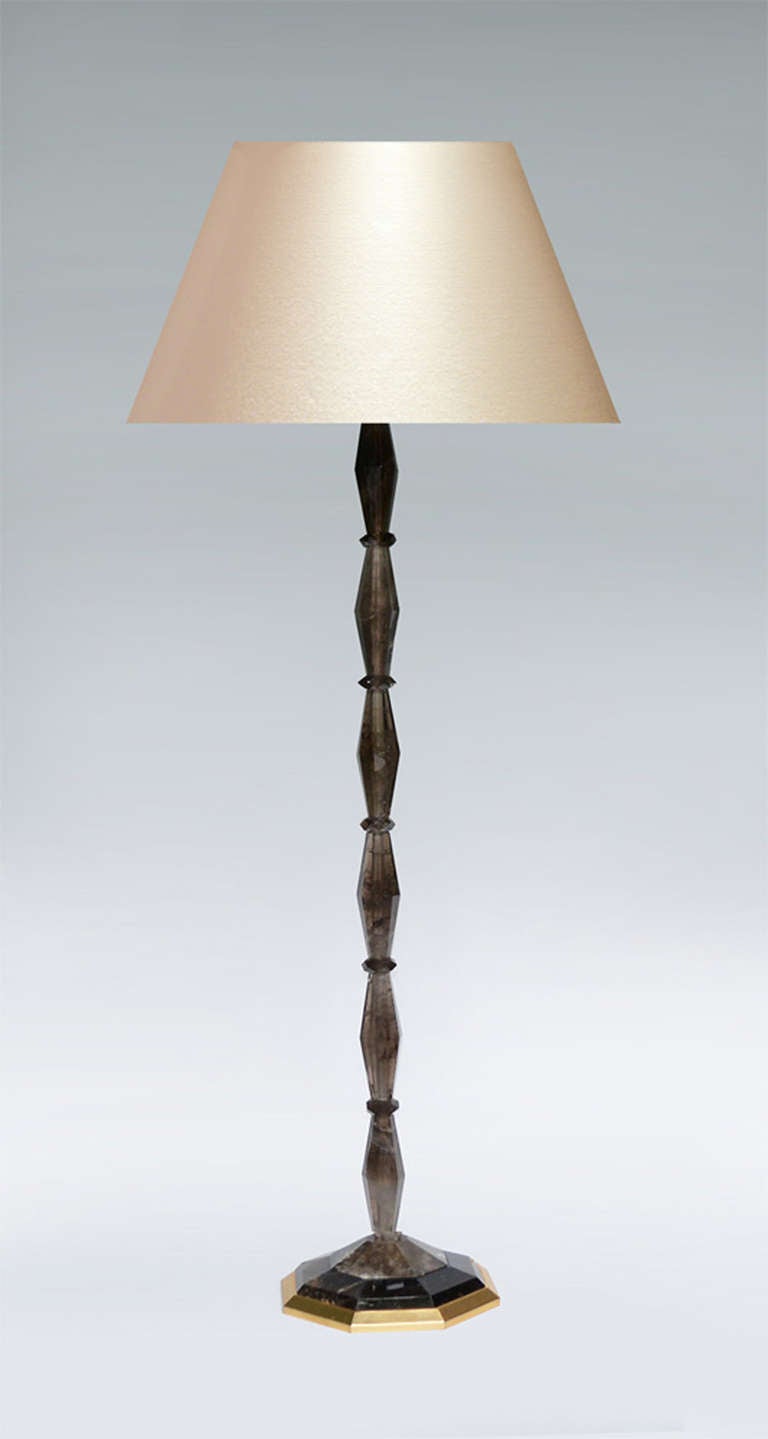 A fine carved Dark rock crystal floor lamp, created by Phoenix Gallery, NYC.
Measures: 70in. height.
(Lampshade not included).