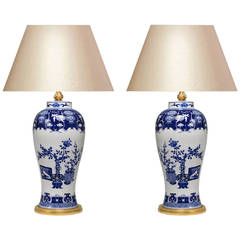 Pair of Blue and White Porcelain Lamps with Gilt Brass Bases