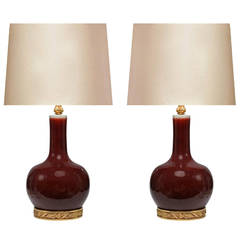 Pair of Copper Red Glazed Porcelain Lamps with Gilt Bronze Bases 9