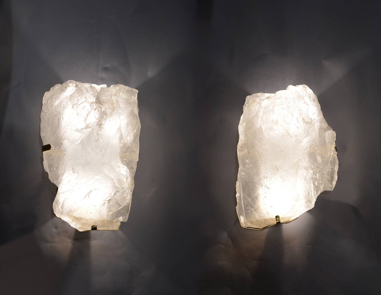 Pair of natural form rock crystal sconces.