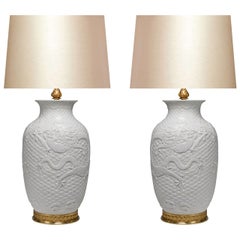Pair of White Porcelain Lamps with Gilt Bases