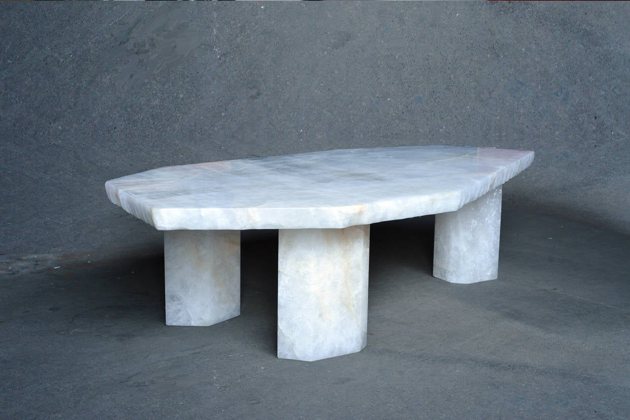 Scalene polygon form craftsmanship rock crystal low table. Large-scale top rests on three individual solid legs, designed by Adam Fuks.