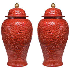 Pair of Fine Carved Red Glazed Porcelain Jars with Covers