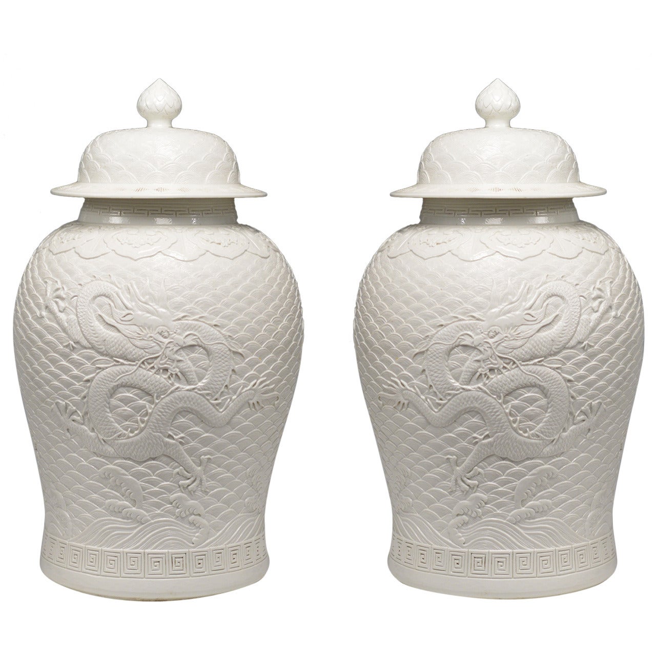 Pair of Well-Carved Blanc-de-Chine White Porcelain Jars with Covers