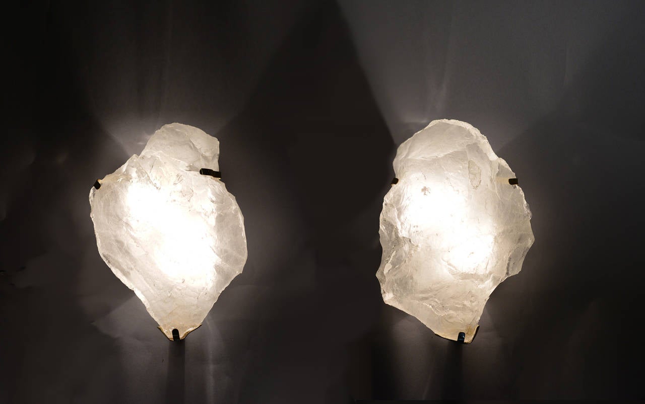 Pair of natural form rock crystal sconces.