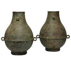 A Pair Of Bronze Vases