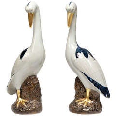 A Pair Of Porcelain Figures Of The Cranes