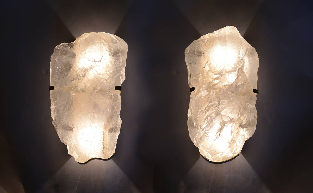 Pair of natural form rock crystal sconces.
Measures: 8.5