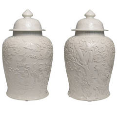 Pair of Finely Carved Blanc-de-Chine Porcelain Jars