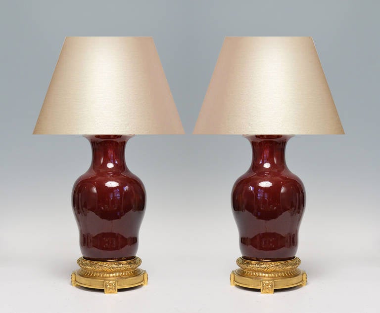 Pair of Ormolu Mounted Oxblood Porcelain Lamps