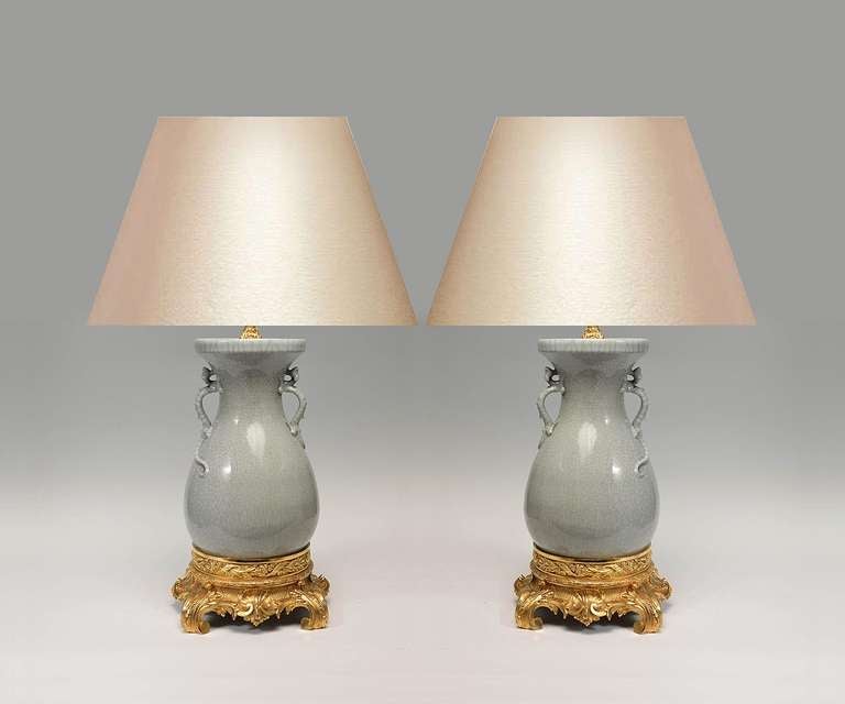 A Guan-type glazed porcelain vases with handles mounted as lamps, circa 1930
(Lampshade not included).