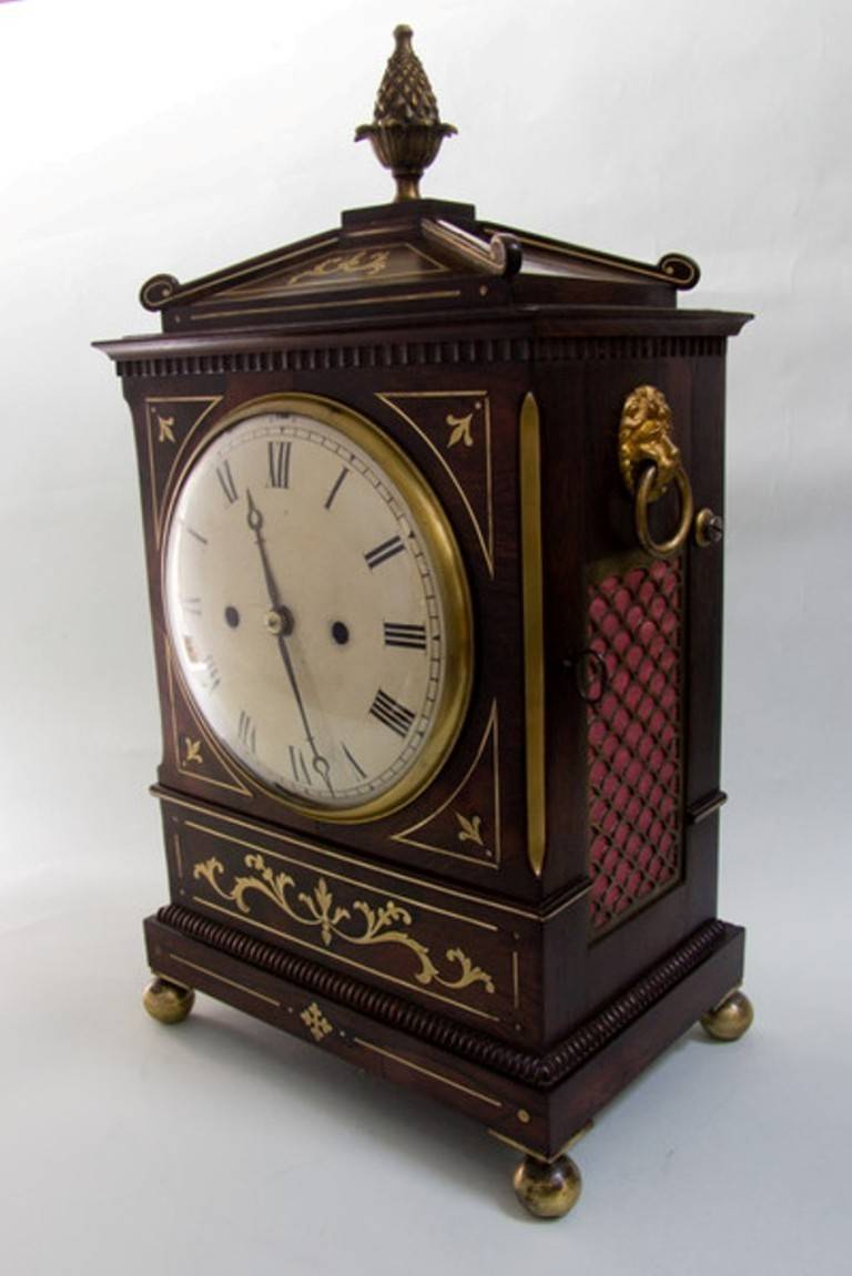 The two train movement is engraved on the back plate with the makers name and address in Clerkenwell, a well-established centre of clockmaking in 19th century, London. There is a strike-silent facility, which is activated via a lever in a slot in