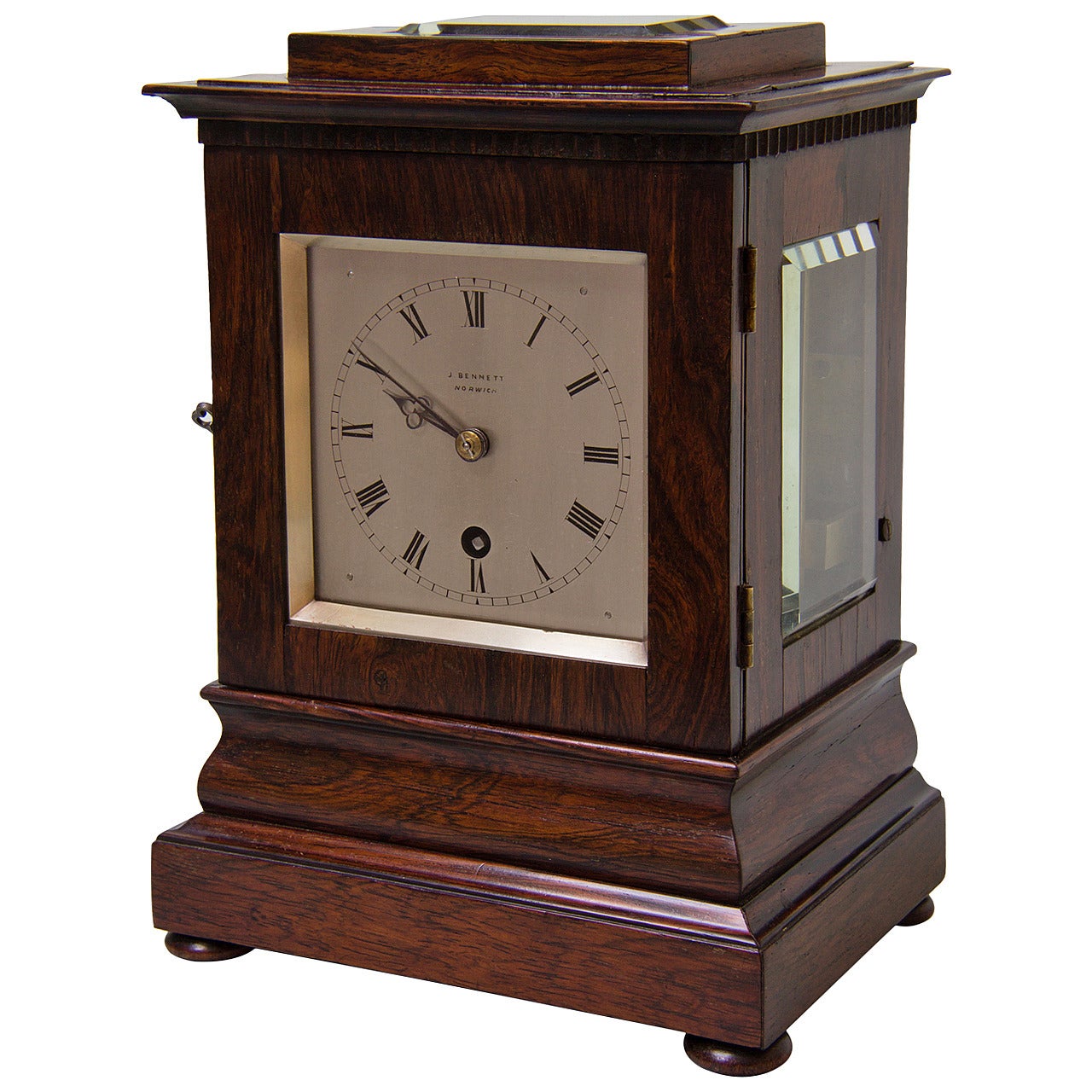 Small rosewood library clock signed J Bennett, Norwich. For Sale
