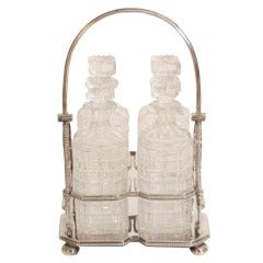 Antique Silver Plate Square Tantalus with Four Bottles and Stoppers