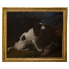 A Seated Spaniel and Pheasant In Landscape by Charles Collins