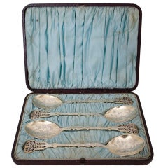 Set of Four Engraved and Pierced Victorian Silver Plated Berry Spoons in Case